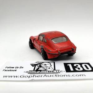 lot 130 image: Vintage (1970s) Corgi Juniors die-cast car, E Type Jaguar (Red sports car)