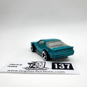 lot 137 image: Rare Vintage 1983 Hotwheels Teal Camaro Z28 (With Errors no Labeling)