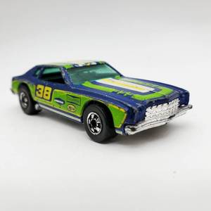 lot 180 image: Hot Wheels 1975 Monte Carlo Stocker 355 #38 Blue Blackwall Tires