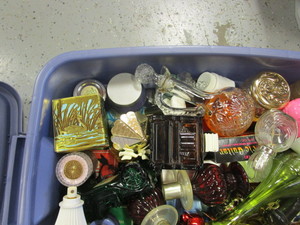 lot 49 image: Tote of Avon Decanters