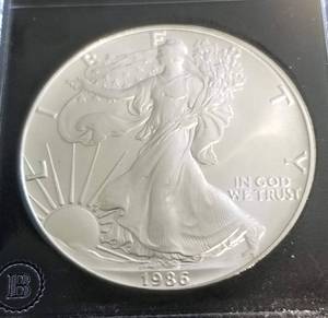 1986 AMERICAN SILVER EAGLE 1 TROY OZ. .999 FINE SILVER BLACK SLAB