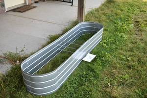 lot 33 image: CASTLECREEK Large Oval Galvanized Steel Planter Box