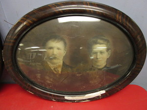 lot 233 image: VINTAGE WOOD WALL FRAMES WITH CONVEX BUBBLE GLASS, WITH ANCESTRAL PHOTOS