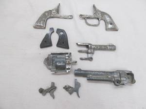 lot 4 image: Metal tot gun parts