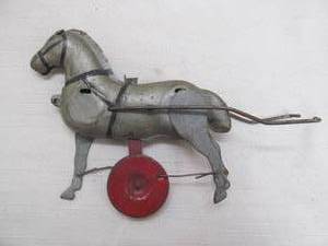 lot 16 image: Vintage tin horse