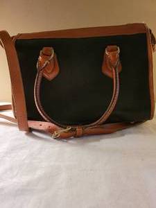 lot 40 image: Navy and brown Dooney and Bourke Handbag