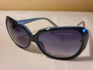 lot 136 image: Sunglasses  and Cologne