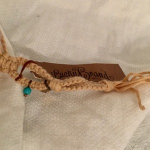 lot 107 image: Lucky Brand bracelet with semi-precious accents