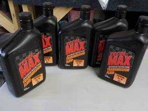 lot 141 image: 5 quarts Zecol Max Transmission Flu...
