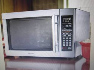 lot 31 image: Magic Chef 1.3 Cu. Ft. Stainless St...