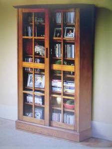 lot 56 image: Merrick Sliding-Door Media Cabinet ...