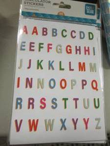lot 99 image: Stack of Letter Sticker Packs...