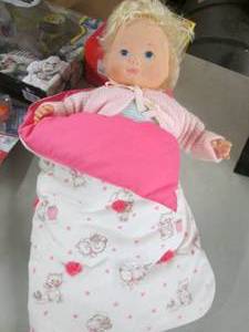 lot 243 image: Doll with Sleep Sacks...