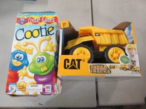 lot 302 image: Cootie, Cat Dump Truck...