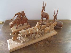 lot 28 image: Carved wood figures...