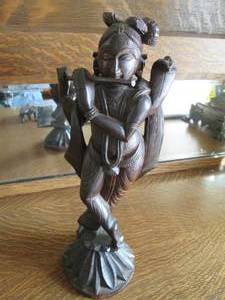 lot 29 image: Carved wood figures...