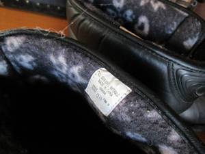 lot 83 image: Covered tote of boots and shoes, kn...