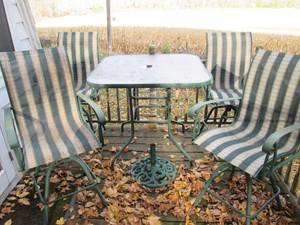 lot 104 image: Patio table with umbrella stand and...