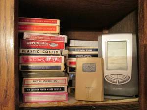 lot 117 image: Playing cards and weather station...