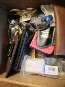 lot 135 image: Lot of sunglasses combs and more...