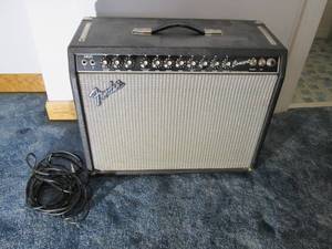 lot 208 image: Fender Concert guitar amp on wheels...