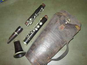 lot 212 image: Antique clarinet with leather case...