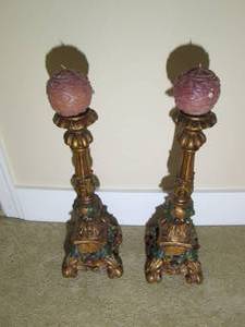 lot 249 image: Pair of decorative candleholders...