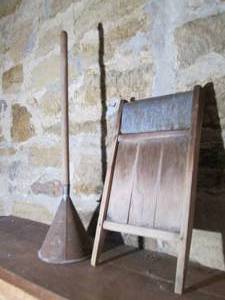 lot 565 image: Antique washboard and agitator...