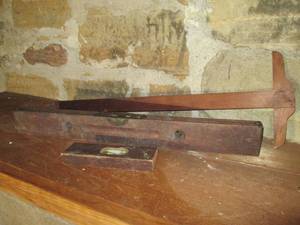 lot 569 image: 2 Antique levelers and a T Square...