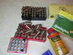lot 608 image: lot of bullets and empty casings ...