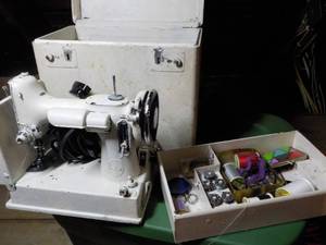 lot 339 image: Very Vintage Sewing Machine in a Ca...