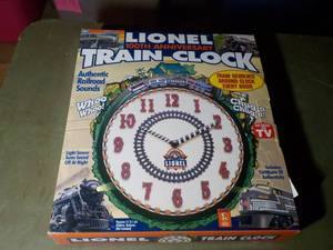 lot 437 image: Vinyl 100th Anniversary Train Clock...