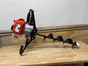 lot 10 image: XTREMEPOWERUS 63 cc V-Type 2-Man Dual Gasoline Powerhead Auger