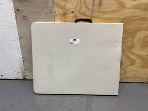 lot 12 image: LIFETIME 6 ft. Fold-in-Half Table Almond