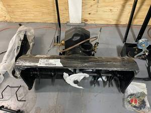 lot 31 image: MTD GENUINE FACTORY PARTS 42 in. 3-Stage Snow Blower Attachment For Troy-Bilt Super Bronco Riding Lawn Mowers (2015 and After)