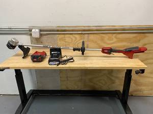 lot 56 image: TORO 60-Volt Max Lithium-Ion Brushless Cordless 14 in.  16 in. String Trimmer - 2.5 Ah Battery and Charger Included