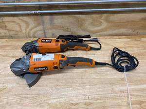 lot 79 image: RIGID Lot of 2-  15 Amp Corded 7 in. Twist Handle Angle Grinders