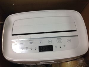 lot 101 image: 10,000 BTU (6,500 BTU, DOE) 115-Volt Portable Air Conditioner with Dehumidifier Function and LCD Remote in White by LG Electronics IN GOOD CONDITIONS  in good condition
