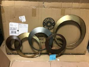 lot 46 image: 38 x 18.7 Metallic Rings Wall Dcor  in good condition