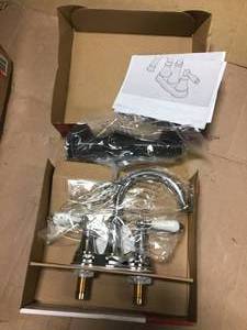 lot 52 image: Courant 4 in. Centerset 2-Handle Bathroom Faucet in Polished Chrome with White Handles by Pfister  in good condition