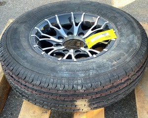lot 56 image: Aluminum Trailer Wheel and Tire