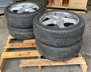 lot 77 image: Konig Alum Rims 17x7 and Goodyear Tires
