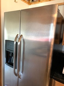 lot 131 image: Fridgidaire Stainless Steel Side by Side Fridge