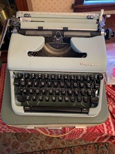 lot 51 image: Vintage Olympia Typewriter w Case (Script Type)