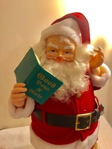 lot 16 image: Animated Coca-Cola Santa Checking His Nice List