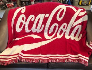lot 38 image: Coca-Cola Fringed Edge Throw