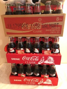 lot 69 image: 3 Cases of Coca-Cola and some Furry Friends
