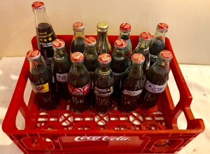 lot 137 image: Coca-Cola Bin with Various Collectors Bottles