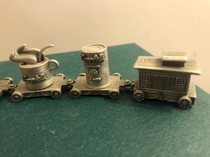 lot 166 image: Small Metal Campbells Clock and Train Set