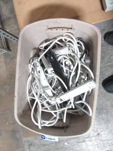 lot 87 image: Tote with a few dozen power strips